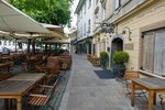 The apartment was situated right in the heart of the old city of Ljubljana. The river was just next to the tables on the left