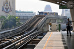 skytrain approaching the station