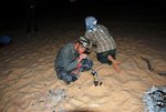 Blowing the Sheesha... why is it buried in the sand?