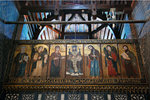 The centre sanctuary screen is dedicated to Virgin Mary. The center of these 7 icons depicts Christ, on His throne. To his right is the Virgin Mary, the Archangle Gabriel and Saint Peter, while to his left  are John the Baptist, the Archangle Michael and Saint Paul.