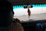 Hey, shouldn't you be looking forward while driving? Especially when it is over 100 km/h (just a wild guess as the speedometer showed ZERO all the time!)