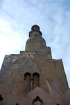 The spiral minaret is inspired by the tower at the Great Mosque of Samarra in Iraq.
