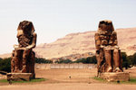 This is not yet the Valley of the Kings, but most visitors will see them as the first monument as they arrive in the West Bank -- Colossi of Memnon. (18M tall, the only remains of Amenhotep's mortuary temple)