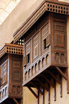 These are Arabesque-style Mashrabiyas, which characterize the Islamic style to which Wikala of al-Ghouri was built.