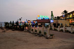 A beach front shopping mall and restaurant. It was getting dark, no good stuff could be found on the beach~