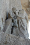 Denial of Jesus by St. Peter,
Passion Facade, Sagrada Familia. Those were the maidens who thought St. Peter was one of them. St. Peter was actually sulking in grief. (not shown in photo)