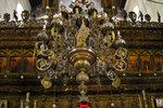 The giant chandelier right in front of the main altar