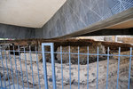 It is elevated on pillars and has a glass floor, so that visitors can still see the original church below (also octagonal)