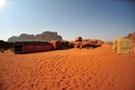 It was situated in the Wadi Rum desert and had a toilet and shower facilities. (ie running water and electricity)