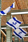Israeli flags waving at the entrance