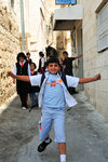 Palestinian kids getting off school... What a cheerful bunch! This kid ran too fast for me to get a good shot!