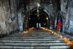 A wide stairway of nearly 50 candle-lit steps led down to the crypt.