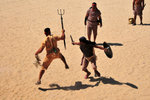 Retiarius fighting with net and trident vs. a slave with shield and gladius