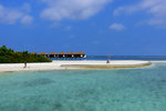 Those huts belong to the Spa by Clarins, the only Clarins presence in Maldives
