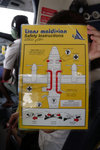 No flight attendent will describe the emergency procedure, so it is up to you whether you want to read it or remember it