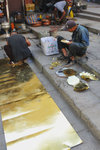 Workers working to produce brasswareand silverware