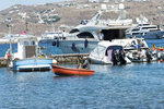 It is not often to see a non-motorized vessel sailing inside the marina