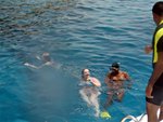 When I got back to the boat after my first snorkel, one of her friends was seemingly having a good time with the fat instructor/guide
