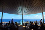 At the back of Oceanview Cafe. This has the best view to enjoy your meal (that is before the sun is out)