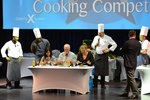 ... and they hungrily tasted their food... btw, all cooking was done by the chef and the only contribution by the big guy was the massage he gave to the judges!