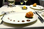 This is the Diver Scallop Wellington Style, Baked in Puff Pastry; Black Truffle Emulsion, Spinach Fondue