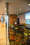 If you are tired of watching the sea, you can sit on these bar seats and enjoy the LCD TV while eating.