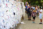 This wishing wall is covered in rags. Turks tie the bits of cloth/paper to a frame and make a wish
