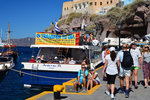 If you have not been to Santorini before, it is recommended you to take the boat to Oia and took the bus back to Fira afterwards