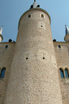 Pointed turrent, with unconventional arrow slits (cross and orb shaped) for the flexibility of shooting at various angles.
