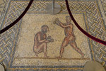 Two fighting athletes - Main scene of a pavement representing two fighting nude pugilists. Their hands are protected with gloves. The scene is quite similar to a modern boxing match.