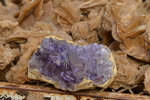 All the kids came around trying to sell these kind of crystalline rocks to us. Pawel told us the amethyst colour was artificial.