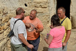 The owner was letting us taste the olive remains (after pressed), which were usually fed to our old pal the camel there.