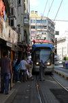 You can see how narrow the pedistrain's walkway is... and people have been walking along the main traffic during the holidays... luckily they have skillful tram drivers..