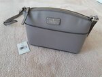 Brand New Kate Spade Grove Street Cityscape Crossbody bag  Local pick up and cash only  Retail was CDN $ 239+ taxes = $267.68  NOW CDN $150  Rare color  Condition: Brand New With Tag  SIZE:6.1"h x 8.6"w x 3"d drop length: 22"  MATERIAL:boarskin embossed 