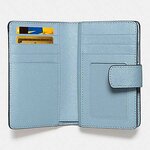 Brand New Coash Light Blue Small Medium Wallet  MEDIUM CORNER ZIP WALLET IN CROSSGRAIN LEATHER (COACH F54010)  Details Crossgrain leather Six credit card slots Bill compartments ID window Zip-around and snap closures 6 1/4" (L) x 4" (H)  COACH MSRP:$165 NOW CDN $120