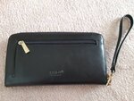 Brand New in box. ELLE black RFID long wallet purse wristlet  Cdn $60  Lot of compartments for credit cards and bills and coins  Anti thief RFID.  Great for travelling