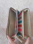 Preloved Kate Spade Gold Neda Long Wallet  Local pick up in E. Van and Cash only  Condition: Used - Good with wear and tear (as you see on the 2nd pic)  Was $ 145 + taxes = $162.40 NOW: Cdn $50