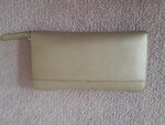 Preloved Kate Spade Gold Neda Long Wallet  Local pick up in E. Van and Cash only  Condition: Used - Good with wear and tear (as you see on the 2nd pic)  Was $ 145 + taxes = $162.40 NOW: Cdn $50