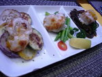 Gratinated scallops with asparagus & squid-ink spaghetti $138