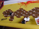 Embroidery -pattern of clound in golden thread