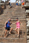 a very nice couple holding hand and walk down to the gound. very match!!
