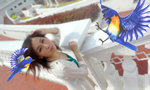 Girl surprised by the flying birds