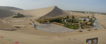 風吹進這種沙丘形成的環山洼地,會產生向上的運動方式,于是吹來的沙子,又被送回到高大的沙山,這種獨特的地形,是月牙泉從未被流沙掩埋的原因,也成就了數千年來的沙水奇觀.6613_14