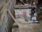 Erecting fwk to wall at ST-3  of M2F-M3F