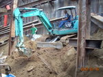 Backfilling soil at M1F(1)