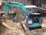 Backfilling soil at M1F(1)