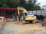 Breaking existing concrete for temp. washing truck(2)