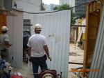 Welding of temporary fencing for drainage work at worker's entrance