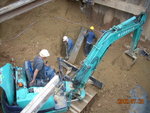 Backfilling soil at M1F
